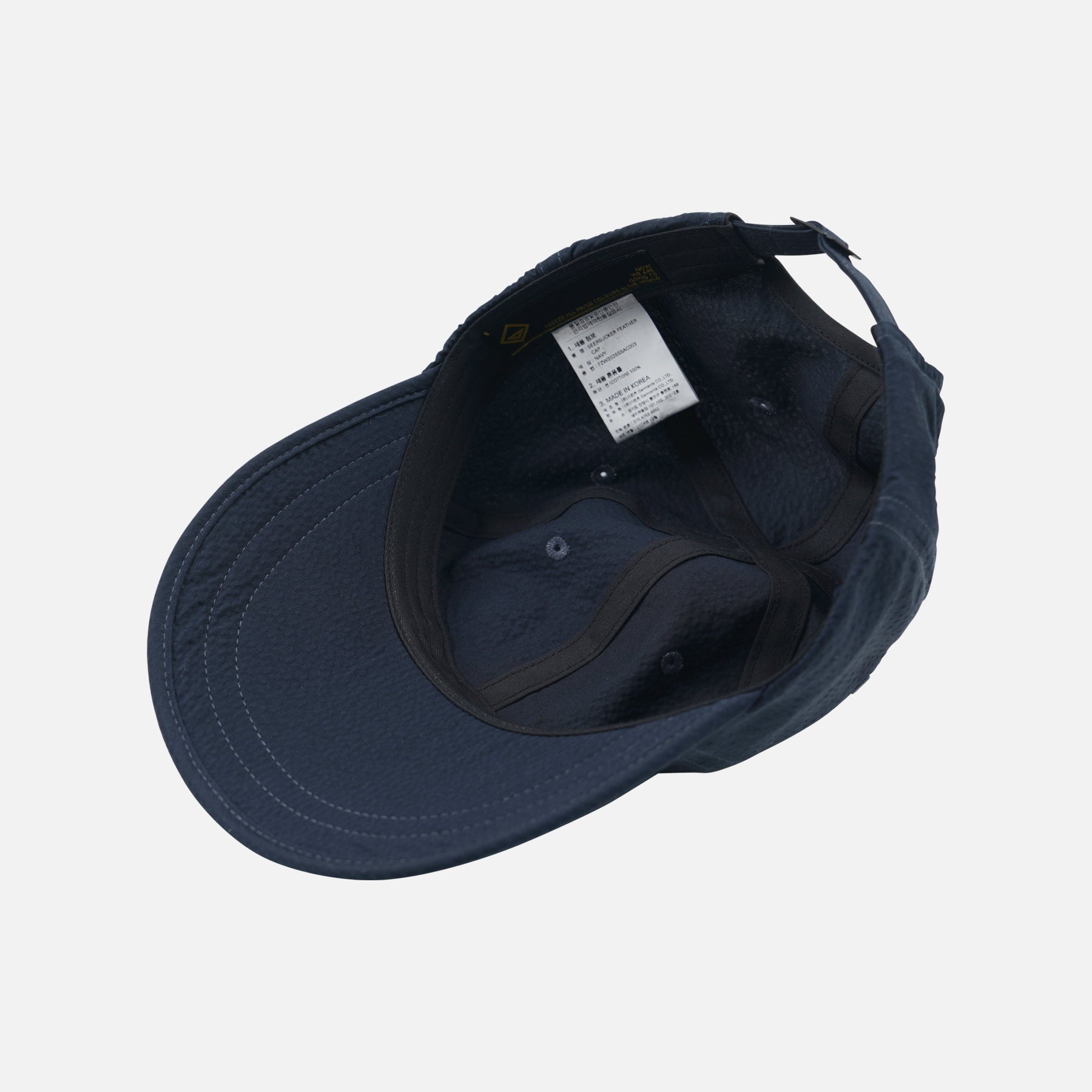 SEERSUCKER FEATHER CAP - NAVY