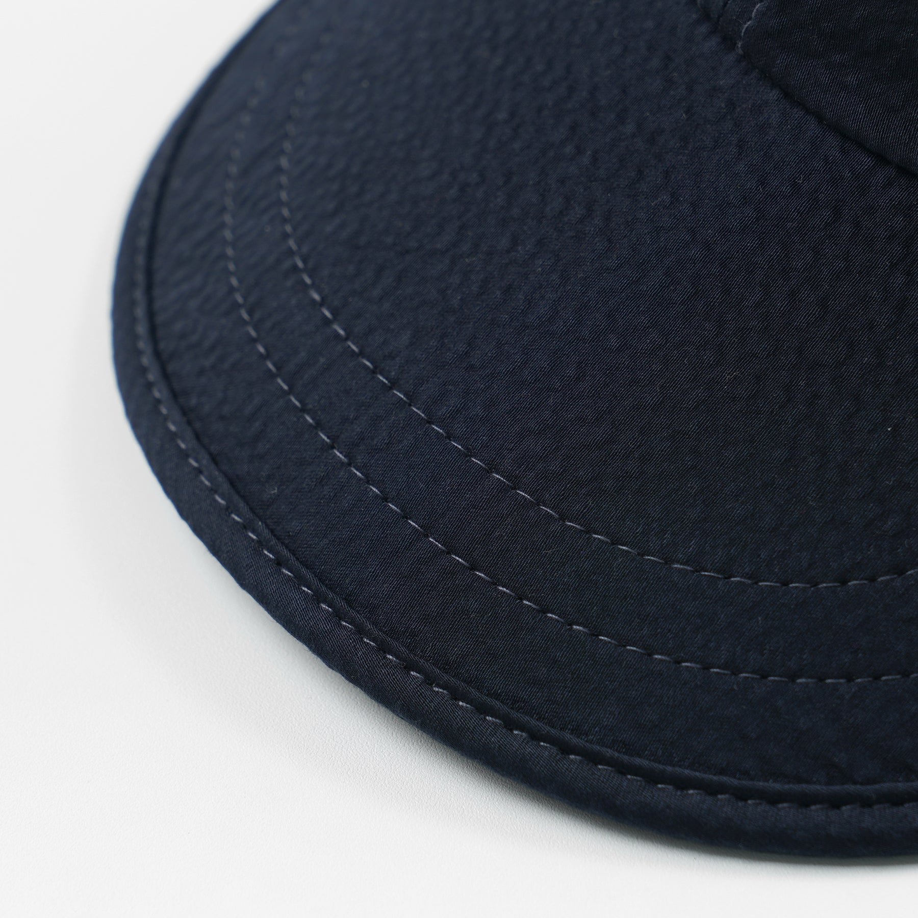 SEERSUCKER FEATHER CAP - NAVY
